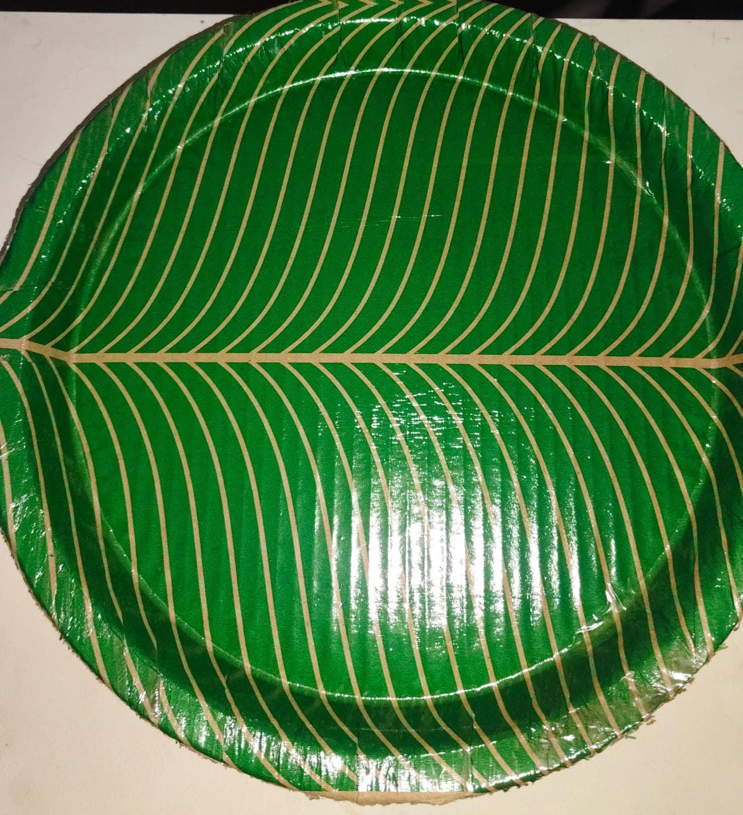 Green paper plate